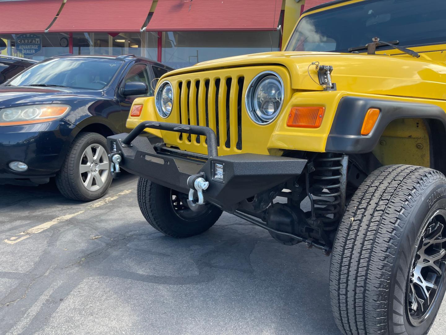 2000 Solar Yellow /Black Jeep Wrangler SE (1J4FA29P9YP) with an 2.5L 4 Cyl. engine, Manual transmission, located at 801 South State Street, Salt Lake City, UT, 84111, (801) 328-0098, 40.751953, -111.888206 - Wow extremely rare to find extra clean Jeep in immaculate condition 4x4! Low miles only 98,248 miles! Interior and exterior are both in excellent shape for the year. This is a clean title no reported accidents on the CarFax history report. It has passed emissions already and is ready to go. Featur - Photo#32